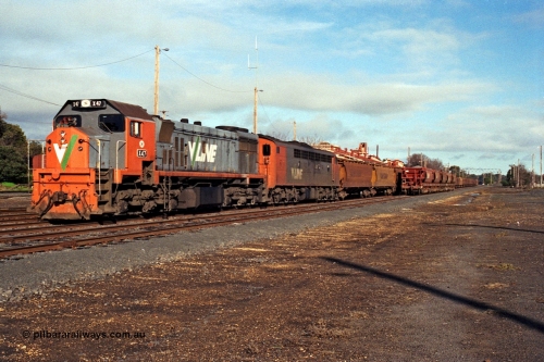109-13
Seymour, station rationalised yard overview with V/Line broad gauge stabled grain train, X class X 47 Clyde Engineering EMD model G26C serial 75-794 and S class S 307 'John Pascoe Fawkner' Clyde Engineering EMD model A7 serial 57-171, V/Line Grain VHGF type bogie grain waggons, loaded VZMF type bogie ballast hopper waggons next to grain train.
Keywords: X-class;X47;Clyde-Engineering-Rosewater-SA;EMD;G26C;75-794;