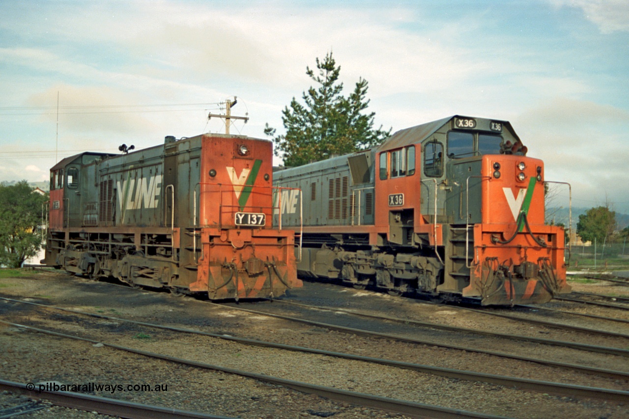 110-18
Wodonga loco depot, turntable roads, V/Line broad gauge Y class Y 137 Clyde Engineering EMD model G6B serial 65-403 and X class X 36 Clyde Engineering EMD model G16C serial 66-489 rest between jobs.
Keywords: Y-class;Y137;Clyde-Engineering-Granville-NSW;EMD;G6B;65-403;X-class;X36;G16C;66-489;