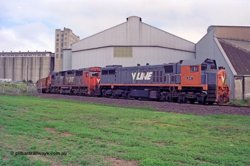 111-22
North Geelong grain loop, V/Line broad gauge locos X class X 47 Clyde Engineering EMD model G26C serial 75-794 and N class N 461 'City of Ararat' Clyde Engineering EMD model JT22HC-2 serial 86-1190 unload their train, grain complex behind locos.
Keywords: X-class;X47;Clyde-Engineering-Rosewater-SA;EMD;G26C;75-794;