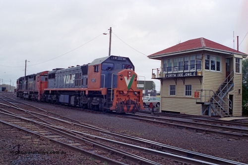 111-25
North Geelong C Box, V/Line broad gauge locomotives X class X 47 Clyde Engineering EMD model G26C serial 75-794 and N class N 461 'City of Ararat' Clyde Engineering EMD model JT22HC-2 serial 86-1190 run from the sorting yard back to the grain arrivals yard, ground dwarf disc signal 18 is pulled off for the move, signal box.
Keywords: X-class;X47;Clyde-Engineering-Rosewater-SA;EMD;G26C;75-794;
