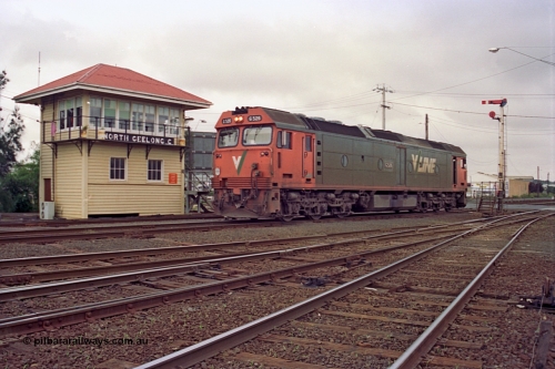 111-28
North Geelong C Box, V/Line broad gauge light loco G class G 526 Clyde Engineering EMD model JT26C-2SS serial 88-1256 shunts back into North Geelong Yard for an empty grain train rake, framed between the signal box and semaphore signal post 16.
Keywords: G-class;G526;Clyde-Engineering-Somerton-Victoria;EMD;JT26C-2SS;88-1256;