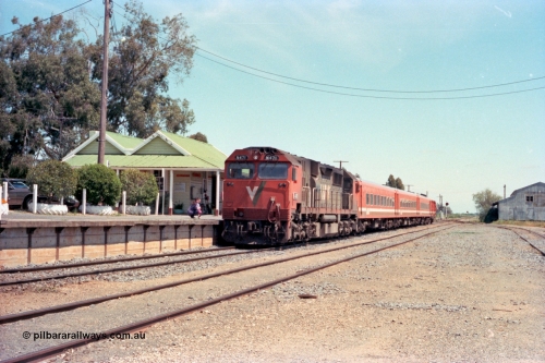 114-02
Cobram, V/Line broad gauge N class N 471 'City of Benalla' Clyde Engineering EMD model JT22HC-2 serial 87-1200, N set N 3, D van, down passenger train arriving at station, yard view.
Keywords: N-class;N471;Clyde-Engineering-Somerton-Victoria;EMD;JT22HC-2;87-1200;