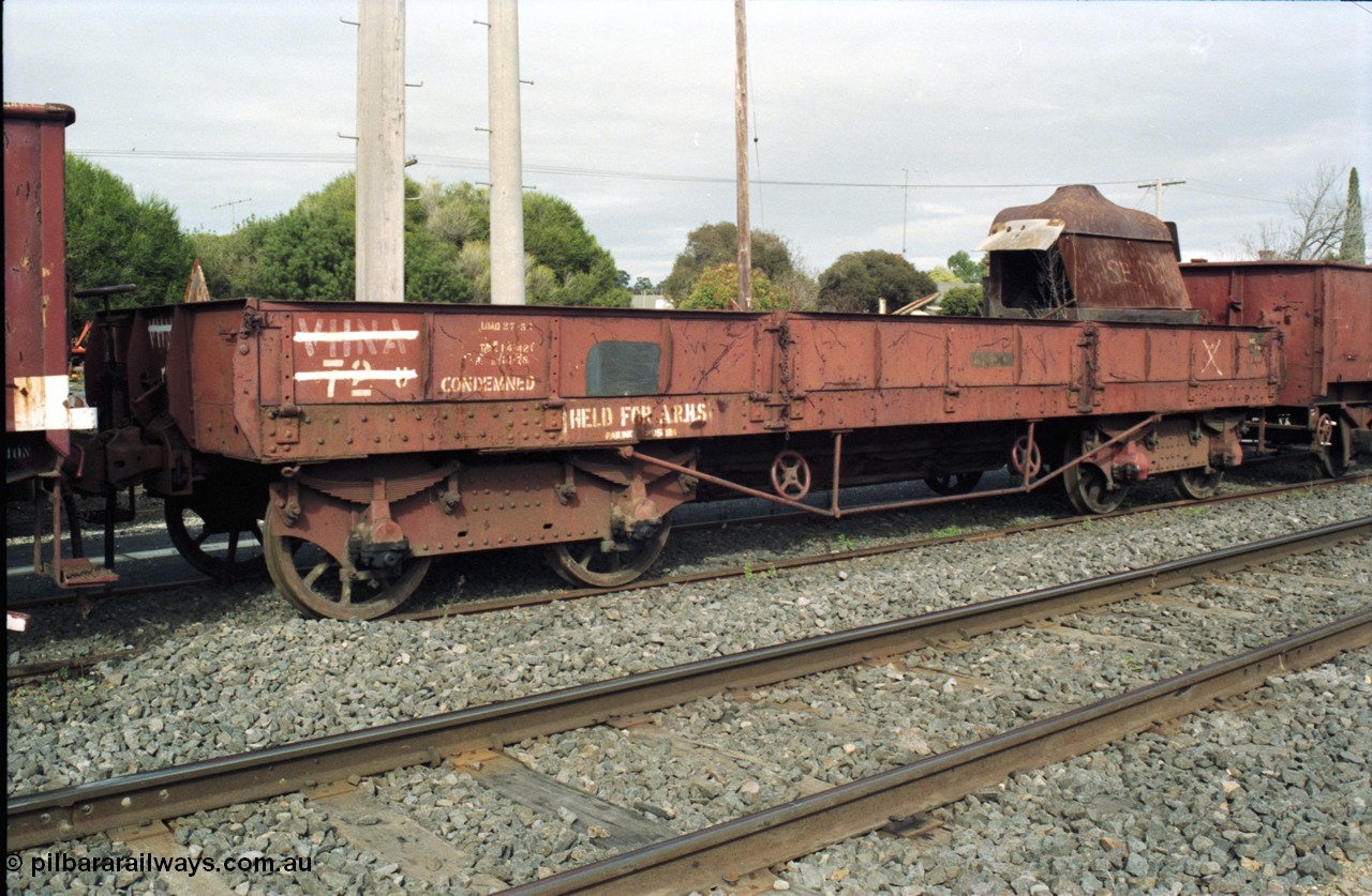 117-14
Benalla, stored broad gauge waggons, VHNA type bogie ballast waggon with plate frame bogies VHNA 72, stencilled 'Held for ARHS'. Built by Newport Workshops in June 1913 at QN type, in February 1981 recoded to VHNA type and placed off register in May 1984. 
Keywords: VHNA-type;VHNA72;Victorian-Railways-Newport-WS;QN-type;