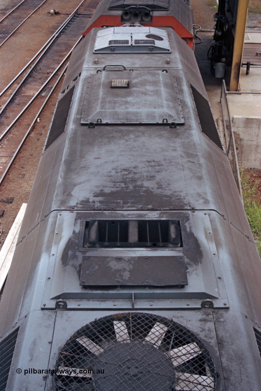 121-03
Albury loco depot, V/Line standard gauge G class Clyde Engineering EMD model JT26C-2SS roof detail view.
Keywords: G-class;G526;Clyde-Engineering-Somerton-Victoria;EMD;JT26C-2SS;88-1256;