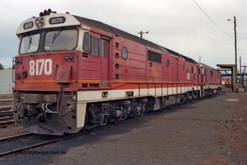 121-09
Albury yard loco depot, standard gauge NSWSRA 81 class 8170 Clyde Engineering EMD model JT26C-2SS serial 85-1089 in candy livery, with a sister 81 class, V/Line C class in the background, looking south.
Keywords: 81-class;8170;Clyde-Engineering-Kelso-NSW;EMD;JT26C-2SS;85-1089;