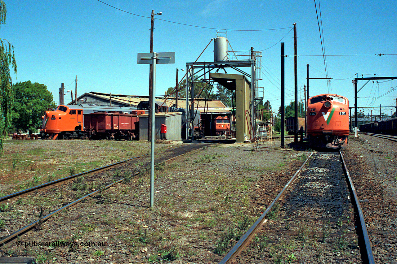 122-09
Traralgon loco depot overview, looking west from east end, sanding tower and fuel point, A class Clyde Engineering EMD model AAT22C-2R, HD waggon for sand transport and storage, T class Clyde Engineering EMD model G8B, G class Clyde Engineering EMD model JT26C-2SS, S class S 317 'Sir John Monash' Clyde Engineering EMD model A7 serial 61-240.
Keywords: S-class;S317;Clyde-Engineering-Granville-NSW;EMD;A7;61-240;bulldog;