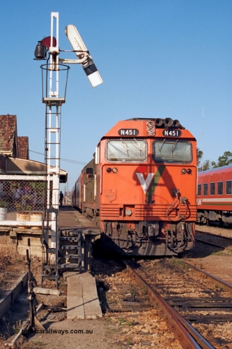 123-1-09
Bairnsdale station, V/Line broad gauge N class N 451 'City of Portland' Clyde Engineering EMD model JT22HC-2 serial 85-1219 up passenger train, signal post.
Keywords: N-class;N451;Clyde-Engineering-Somerton-Victoria;EMD;JT22HC-2;85-1219;