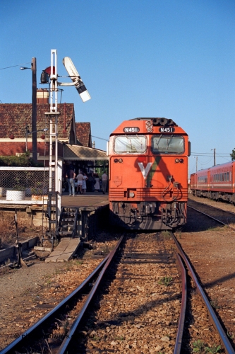 123-1-11
Bairnsdale station, V/Line broad gauge N class leader N 451 'City of Portland' Clyde Engineering EMD model JT22HC-2 serial 85-1219 up passenger train, signal post.
Keywords: N-class;N451;Clyde-Engineering-Somerton-Victoria;EMD;JT22HC-2;85-1219;
