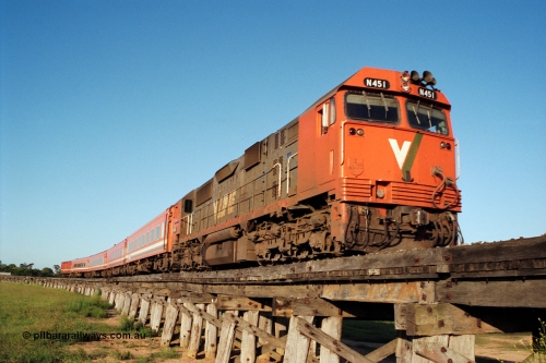 123-1-20
Avon River trestle bridge over flood plain, V/Line broad gauge N class N 451 'City of Portland' Clyde Engineering EMD model JT22HC-2 serial 85-1219, N set, up Bairnsdale pass.
Keywords: N-class;N451;Clyde-Engineering-Somerton-Victoria;EMD;JT22HC-2;85-1219;