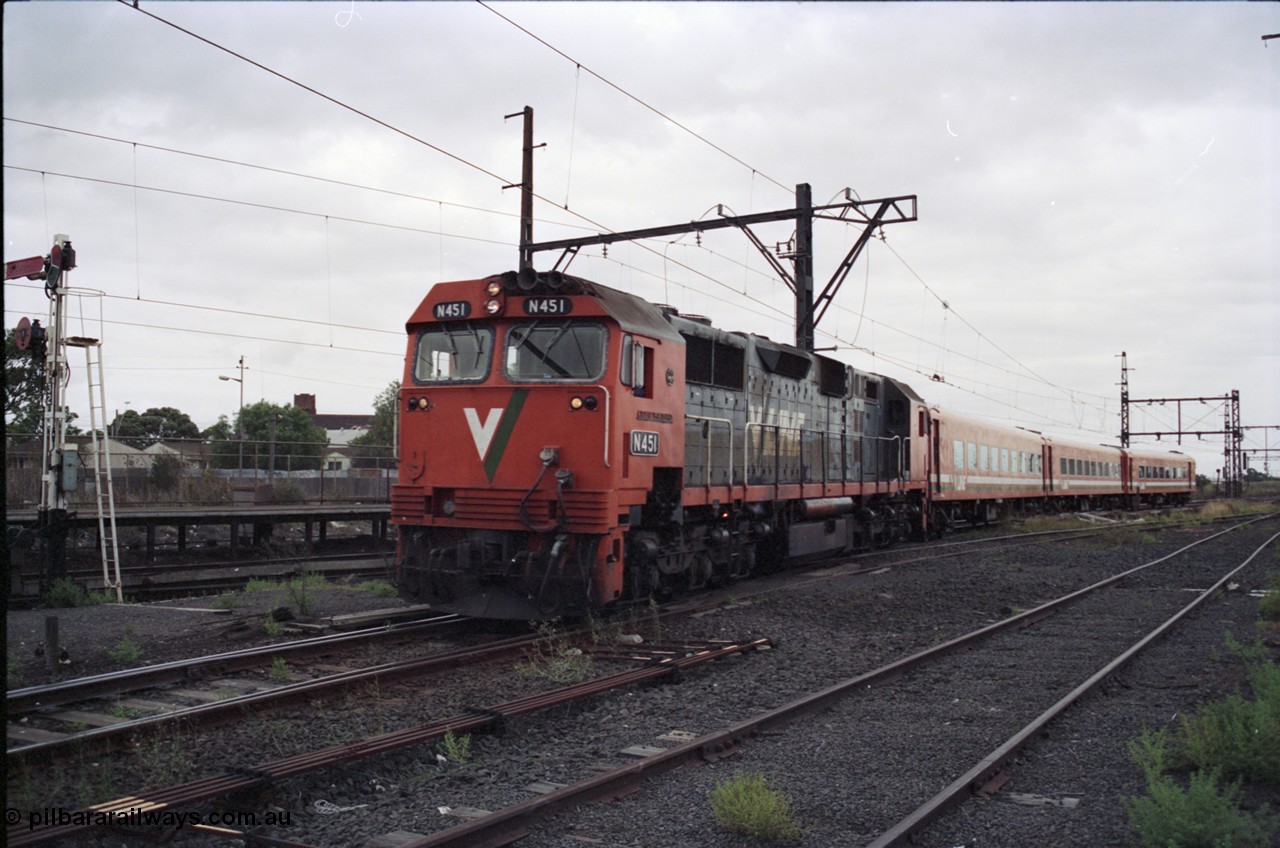 123-2-26
Sunshine V/Line broad gauge down Ballarat passenger train with N class leader N 451 'City of Portland' a Clyde Engineering EMD model JT22HC-2 serial 85-1219 and N set.
Keywords: N-class;N451;Clyde-Engineering-Somerton-Victoria;EMD;JT22HC-2;85-1219;