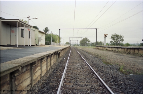 123-2-02
Bunyip, station overview, platform, looking towards Bairnsdale, removed yard tracks on the right, goods platform.
