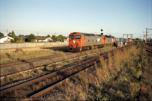 124-12
Sunshine Loop, V/Line standard gauge Sydney bound down goods train with G class G 517 Clyde Engineering EMD model JT26C-2SS serial 85-1230 and another G class
Keywords: G-class;G517;Clyde-Engineering-Rosewater-SA;EMD;JT26C-2SS;85-1230;