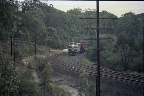 125-12
Kilmore East V/Line broad gauge B class 65 Clyde Engineering EMD model ML2 serial ML2-6 still in Victorian Railways livery leads a sleeper discharge train on the up broad gauge line.
Keywords: B-class;B65;Clyde-Engineering-Granville-NSW;EMD;ML2;ML2-6;bulldog;