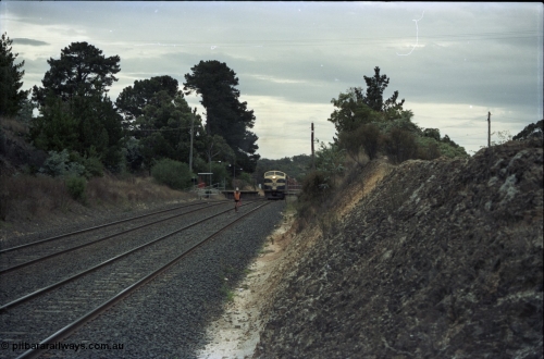 125-18
Heathcote Junction, V/Line broad gauge B class Clyde Engineering EMD model ML2 serial ML2-6 still in Victorian Railways livery leads a sleeper discharge train on the up broad gauge line, ganger walking track.
Keywords: B-class;B65;Clyde-Engineering-Granville-NSW;EMD;ML2;ML2-6;bulldog;