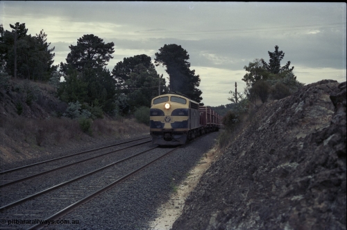 125-19
Heathcote Junction, V/Line broad gauge B class Clyde Engineering EMD model ML2 serial ML2-6 still in Victorian Railways livery leads a sleeper discharge train on the up broad gauge line, topping the grade.
Keywords: B-class;B65;Clyde-Engineering-Granville-NSW;EMD;ML2;ML2-6;bulldog;