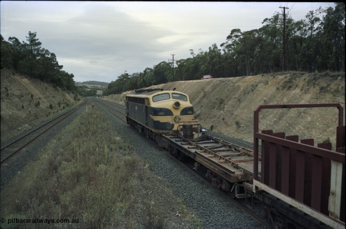 125-21
Heathcote Junction, V/Line broad gauge B class Clyde Engineering EMD model ML2 serial ML2-6 still in Victorian Railways livery leads a sleeper discharge train on the up broad gauge line, rolling down toward Wallan, V/Line VZCA class waggon.
Keywords: B-class;B65;Clyde-Engineering-Granville-NSW;EMD;ML2;ML2-6;bulldog;