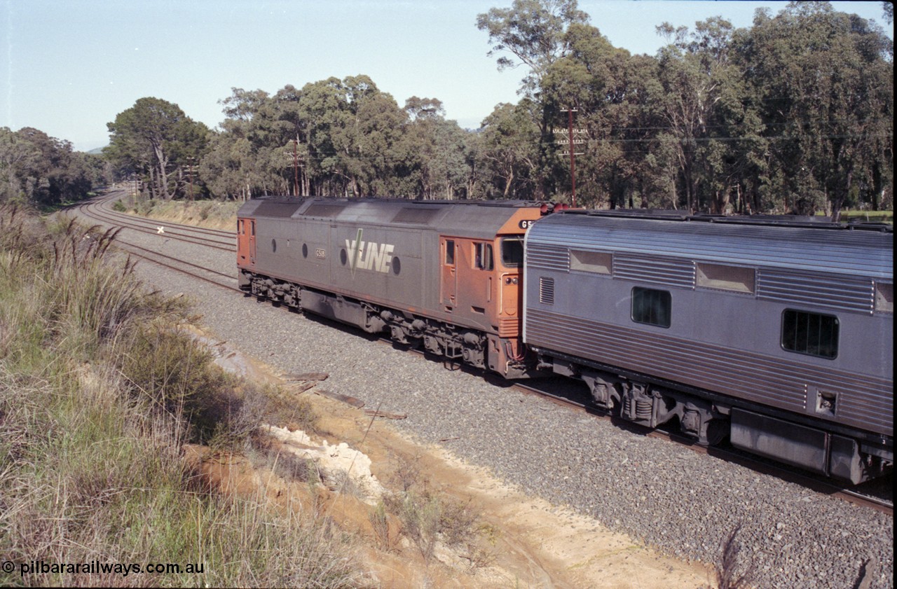 126-16
Broadford, near Smith's Lane, up standard gauge pass Melbourne Express, V/Line G class G 518 Clyde Engineering EMD model JT26C-2SS serial 85-1231, reversing to Broadford Loop, loco failure.
Keywords: G-class;G518;Clyde-Engineering-Rosewater-SA;EMD;JT26C-2SS;85-1231;