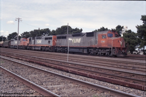 126-11
Tottenham broad gauge train 9169 down goods to Adelaide via Cressy, brake testing at Tottenham , V/Line C classes C 503 Clyde Engineering EMD model GT26C serial 76-826, C 506 serial 76-829 and C 501 'George Brown' serial 76-824. Olex Cables plant in background.
Keywords: C-class;C501;Clyde-Engineering-Rosewater-SA;EMD;GT26C;76-824;C506;76-826;C503;76-829;