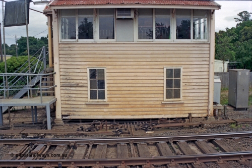 128-08
Ballarat, Linton Junction or Ballarat D signal box, detail view from track side, front elevation, point rodding, interlocking and signal wires, staff exchange platform at left of box, points for Timken's Sidings.
