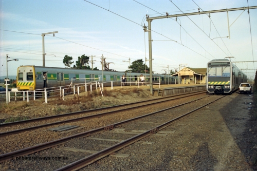 128-34
Nar Nar Goon, down passenger train with Comeng 377M, guard in doorway, station building and platform, 4D (Double Deck Development and Demonstration), double deck suburban electric set, testing phase.
Keywords: 377M;Comeng-Vic;4D;Goninan-NSW;Double-Deck-Development-Demonstration-train;Goninan-NSW;Tangara;