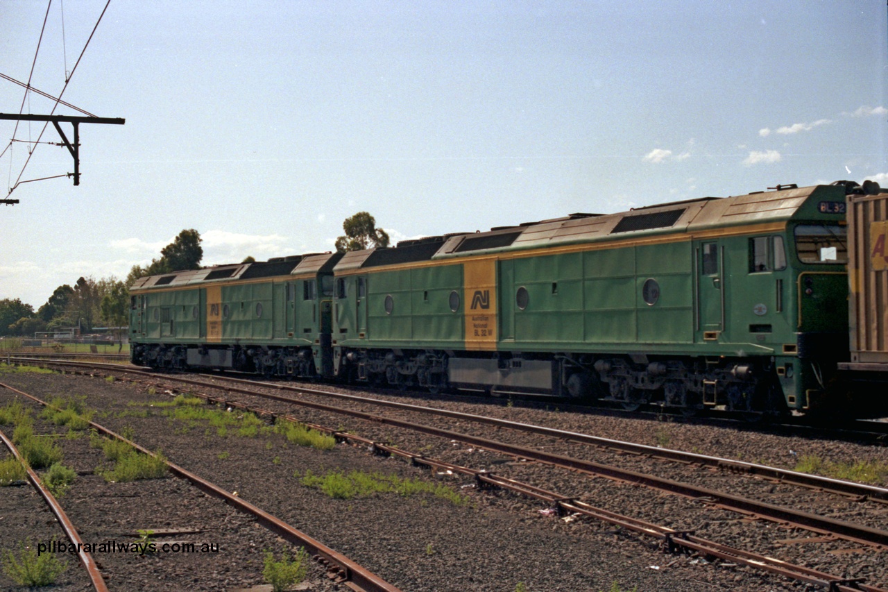 129-1-09
Sunshine, Australian National BL classes BL 33 Clyde Engineering EMD model JT26C-2SS serial 83-1017 and BL 32 serial 83-1016 in AN livery, lead a broad gauge down Adelaide goods train along No.2 Rd onto the South Line, point rodding, trailing view.
Keywords: BL-class;BL32;Clyde-Engineering-Rosewater-SA;EMD;JT26C-2SS;83-1016;