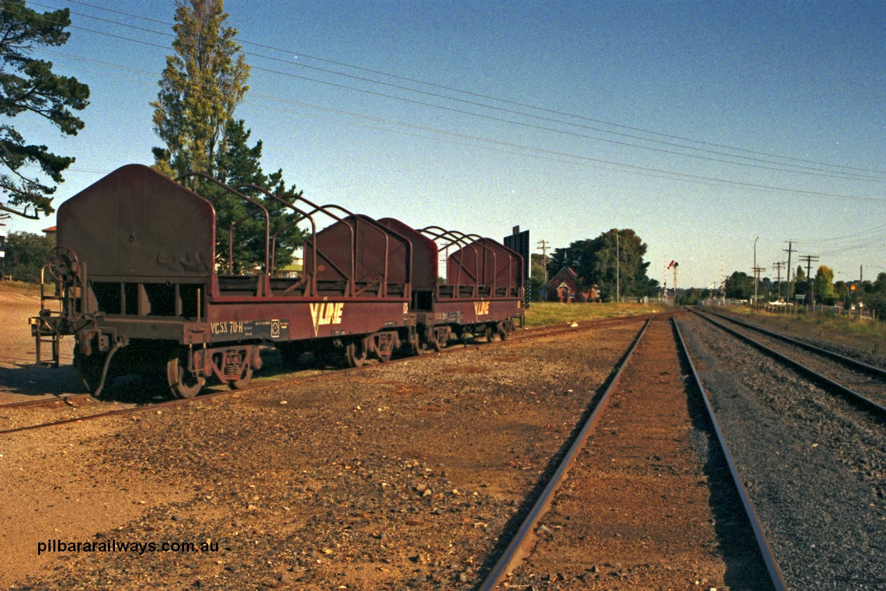 129-1-21
Somerville yard view, looking towards Melbourne, broad gauge V/Line VCSX type bogie coil steel waggons VCSX 70 and VCSX 39 both examples of second batch of sixty CSX type coil steel transport waggons constructed by Ballarat North Workshops to add to the original thirty built at Newport. CSX re-classed to VFSX in 1979 then to VCSX in 1987.
Keywords: CSX-type;VFSX-type;VCSX-type;Victorian-Railways-Ballarat-Nth-WS;VCSX70;VCSX39;