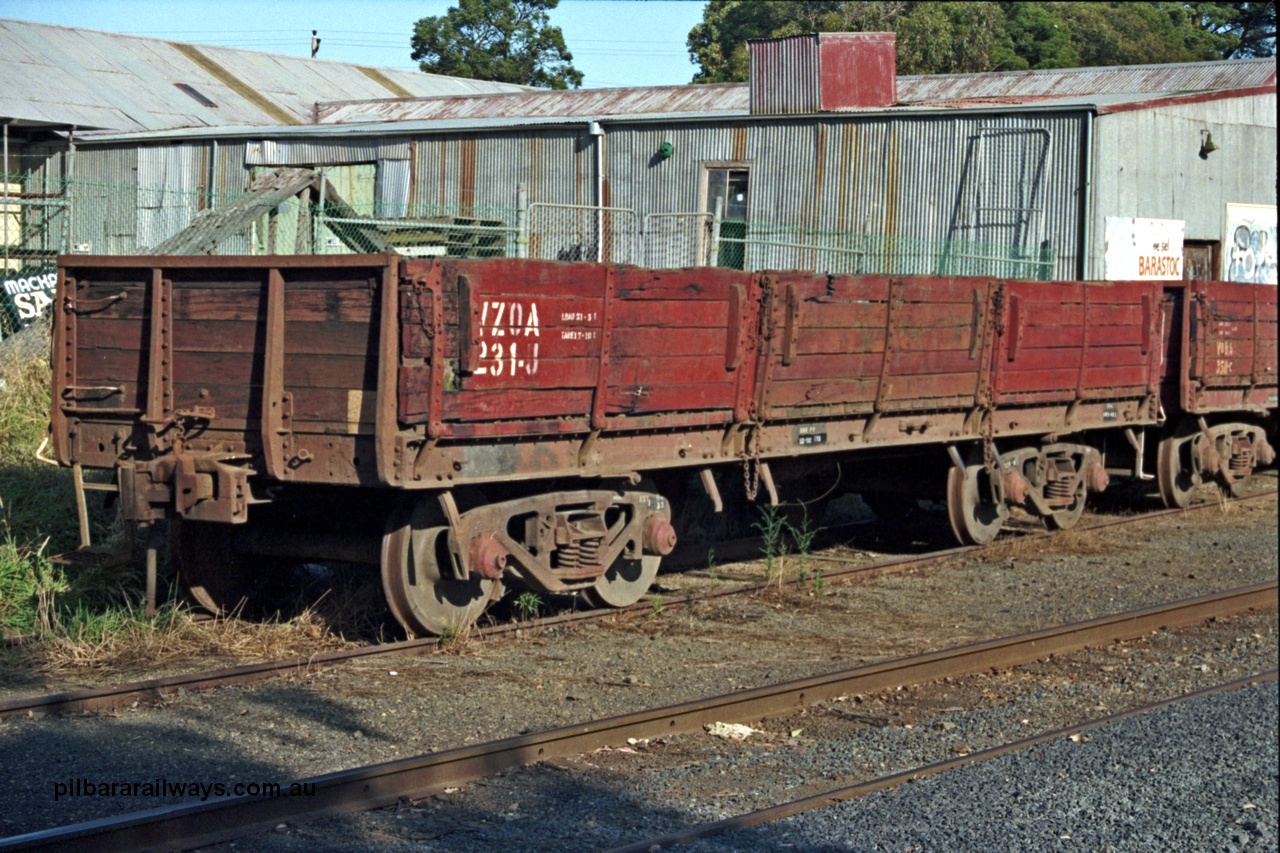 129-1-22
Somerville, broad gauge V/Line VZOA type bogie ballast waggon VZOA 231. Originally built in 1912 by VR Newport Workshops as a member of the 407 strong QR class drop door open waggons. Re-classed in 1979 to VOWA, and in 1985 to VZWA. In 1990 re-classed again to VZOA to operate with the ballast cleaning machine. Coupled to VOWA type VOWA 350.
Keywords: VZOA-type;VZOA231;Victorian-Railways-Newport-WS;QR-type;VOWA-type;VZWA-type;