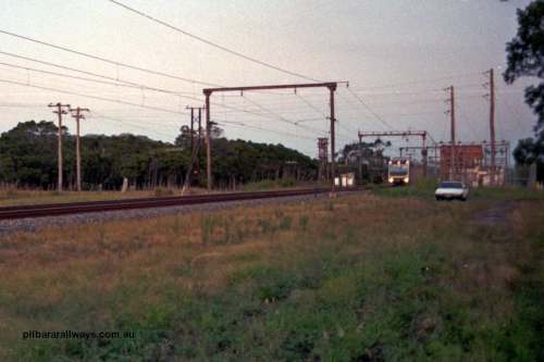 129-1-05
Nar Nar Goon - Tynong section, west of Tynong, 4D (Double Deck Development and Demonstration), double deck suburban electric set, testing phase. The set was built by Goninan NSW in December 1991 as a 'Tamgara' model.
Keywords: 4D;Double-Deck-Development-Demonstration-train;Goninan-NSW;Tangara;