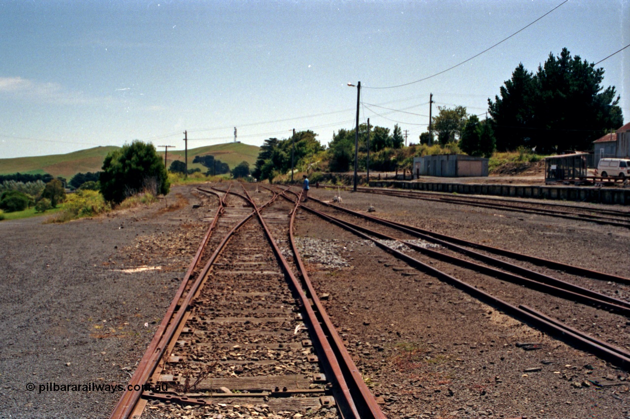 129-2-20
Korumburra yard overview, looking up direction towards Melbourne from the middle of the yard, tracks removed, points spiked reverse.
