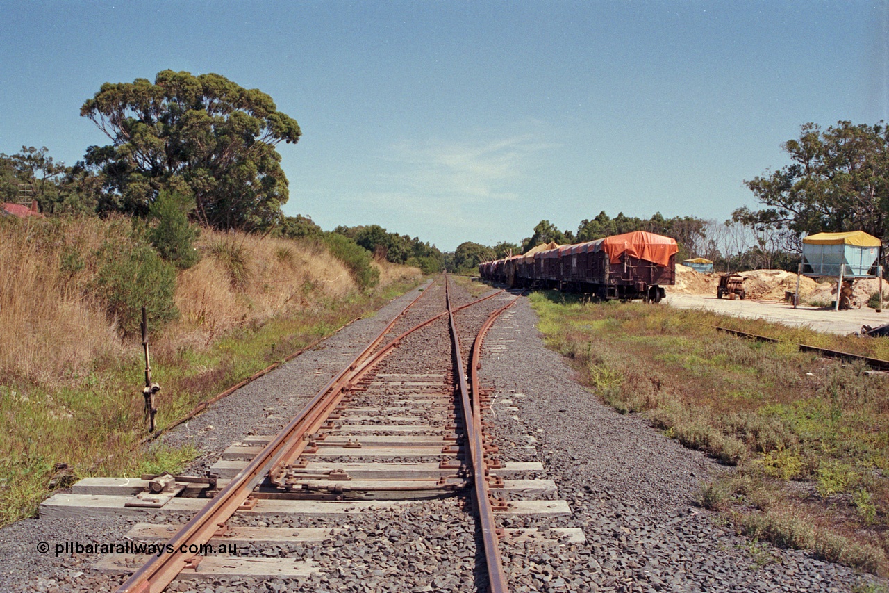 129-2-35
Buffalo station overview, looking towards Melbourne, from east end, points and point lever, super phosphate waggons in yard.

