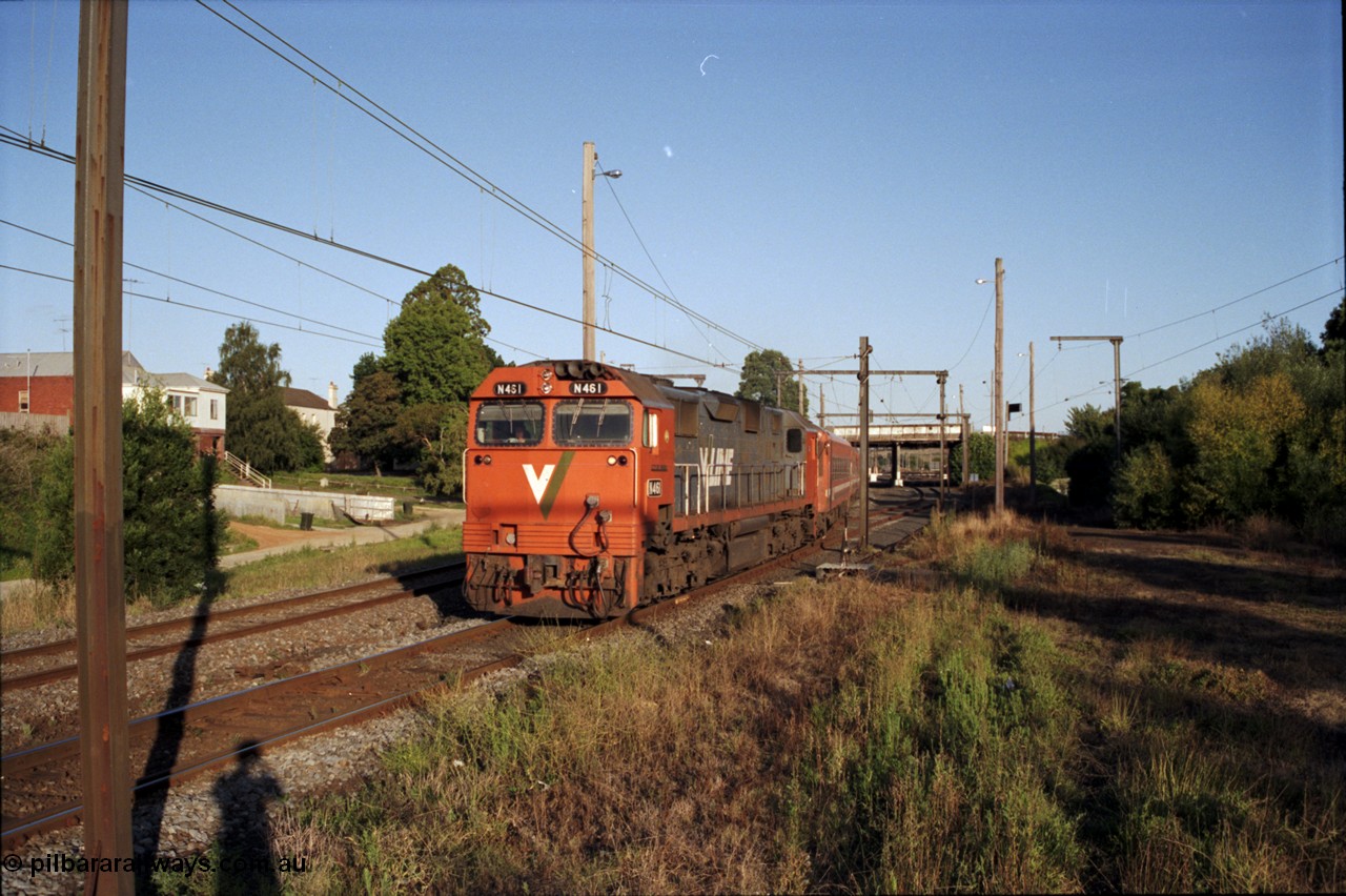129-3-22
Warragul broad gauge V/Line up passenger train hauled by N class N 461 'City of Ararat' Clyde Engineering EMD model JT22HC-2 serial 86-1190 with N set departing, track view, looking towards station, site of former A signal box.
Keywords: N-class;N461;Clyde-Engineering-Somerton-Victoria;EMD;JT22HC-2;86-1190;