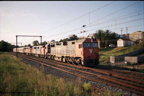129-3-18
Warragul broad gauge V/Line down pass N class N 453 'City of Albury' Clyde Engineering EMD model JT22HC-2 serial 85-1221, A classes A 62 Clyde Engineering EMD model AAT22C-2R serial 84-1183 rebuilt from B 62 Clyde Engineering EMD model ML2 serial ML2-3 and A 66 serial 84-1186 rebuilt from B 66 serial ML2-7, N set .
Keywords: N-class;N453;Clyde-Engineering-Somerton-Victoria;EMD;JT22HC-2;85-1221;