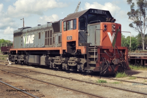 131-1-00
Echuca yard, broad gauge V/Line X class leader X 31 Clyde Engineering EMD model G16C serial 66-484.
Keywords: X-class;X31;Clyde-Engineering-Granville-NSW;EMD;G16C;66-484;
