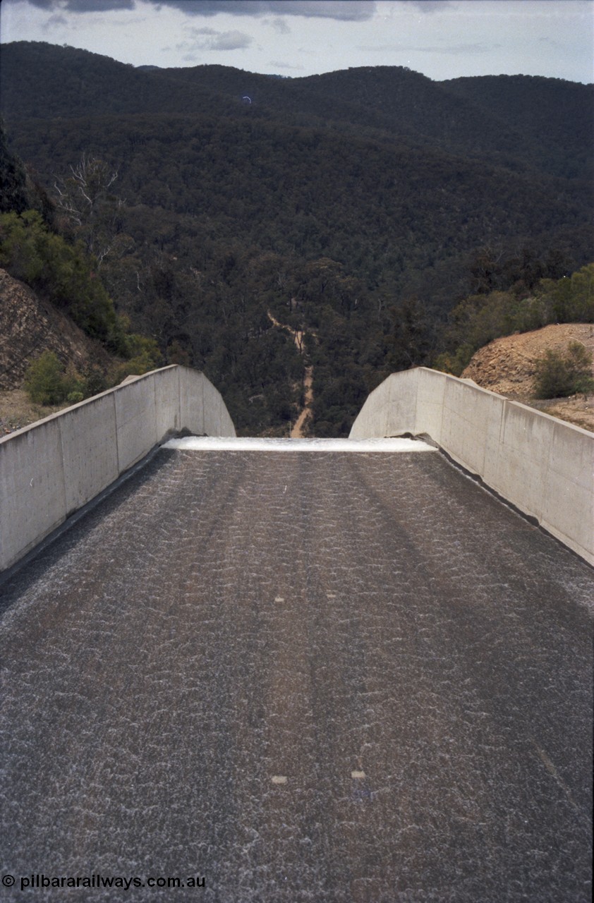 131-2-18
Thomson Dam overflowing, possibly 1992, looking down the spillway from the lookout area. [url=https://goo.gl/maps/o4ET1xcnqyr]GeoData[/url].

