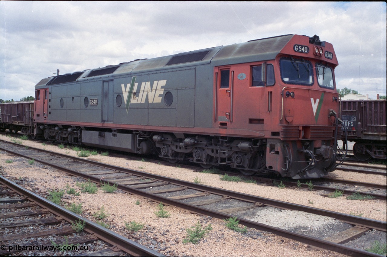 132-02
Ouyen broad gauge V/Line G class G 540 Clyde Engineering EMD model JT26C-2SS serial 89-1273, stabled up gypsum train 9138.
Keywords: G-class;G540;Clyde-Engineering-Somerton-Victoria;EMD;JT26C-2SS;89-1273;
