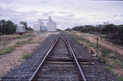 132-30
Kiamal, Murphy silo complex and framers portable silos, yard overview, looking north, point lever, points.
