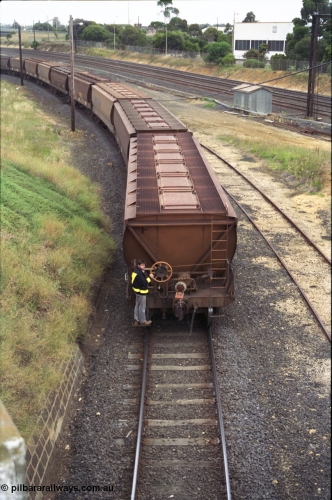 133-11
North Geelong grain loop, shunter on rear grain waggon, Melbourne - Geelong lines at right of image.
