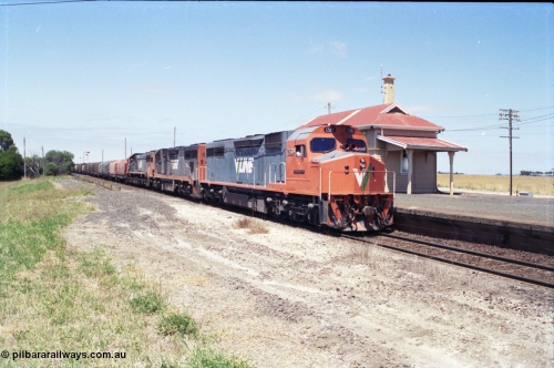 133-23
Gheringhap, V/Line broad gauge locos C class leader C 501 'George Brown' Clyde Engineering EMD model GT26C serial 76-824 leads C 506 serial 76-829 and X class X 45 'Edgar H Brownbill' Clyde Engineering EMD model G26C serial 75-792 with train 9169 down Adelaide goods, pausing for safeworking purposes.
Keywords: C-class;C501;Clyde-Engineering-Rosewater-SA;EMD;GT26C;76-824;
