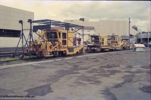 135-09
Ipswich yard, narrow gauge track machines.
Front unit is a Canron Mk I switch tamper, second unit is a Tamper Crib & Shoulder Compactor and the third unit is a Harsco ballast regulator.
