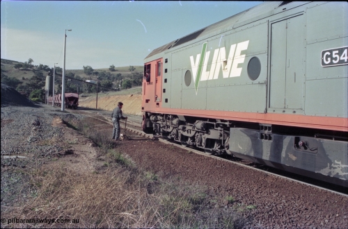 135-16
Kilmore East Apex Quarry siding overview, 2nd person operating points, V/Line broad gauge G class G 540 Clyde Engineering EMD model JT26C-2SS serial 89-1273 runs around rake, loading bins in background.
Keywords: G-class;G540;Clyde-Engineering-Somerton-Victoria;EMD;JT26C-2SS;89-1273;