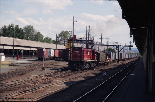 137-2-09
Albury station yard overview, standard gauge NSWSRA candy liveried 48 class 4889 AE Goodwin ALCo model DL531 serial G3420-4 shunts an arrival from Melbourne, the broad gauge 'trans-shipping yard' is to the left of the louvre vans, and a broad gauge diamond is directly in front of the loco.
Keywords: 48-class;4889;AE-Goodwin;ALCo;RSD-8;DL531;G3420-4;