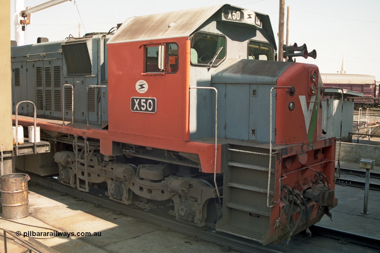 138-06
Bendigo loco depot and fuel point, V/Line broad gauge X class X 50 Clyde Engineering EMD model G26C serial 75-797 at the service roads, cab shot.
Keywords: X-class;X50;Clyde-Engineering-Rosewater-SA;EMD;G26C;75-797;