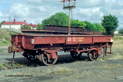 139-18
Ballarat, Doveton Street Sidings, weigh bridge test truck, WTT type four wheel weighbridge test waggon WTT 21, converted from IA type four wheel open waggon IA 7448. Started life as I type I 7448 built by Newport Workshops in January 1905, to IA type in 1935, converted to WTT type in April 1956.
Keywords: WTT-type;WTT21;IA-type;IA7448;Victorian-Railways-Newport-WS;I-type;I7448;