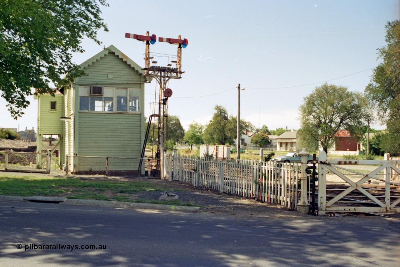 140-1-23
Ballarat North or C Signal Box, looking west, semaphore signal post 4, left arm is the Down Home to Ararat line, right arm is Down Home Maryborough line, and the disc is for the workshop sidings, interlocked gates for Macarthur Street.
