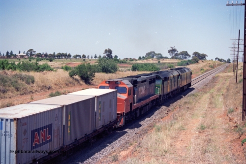 140-1-03
Parwan, up broad gauge Melbourne bound goods climbing Parwan Bank from Bacchus Marsh, could be 9150? Australian National locos BL class Clyde Engineering EMD model JT26C-2SS and 700 class AE Goodwin ALCo model DL500G combined with V/Line C class C 503 Clyde Engineering EMD model GT26C serial 76-826 provide the power.
Keywords: C-class;C503;Clyde-Engineering-Rosewater-SA;EMD;GT26C;76-826;