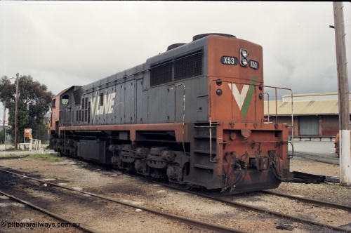 142-2-13
Wodonga loco depot, turntable roads, broad gauge V/Line X class loco X 53 with serial 75-800 a Clyde Engineering Rosewater SA built EMD model G26C rests between jobs at the turntable, goods shed at right, long end view.
Keywords: X-class;X53;Clyde-Engineering-Rosewater-SA;EMD;G26C;75-800;