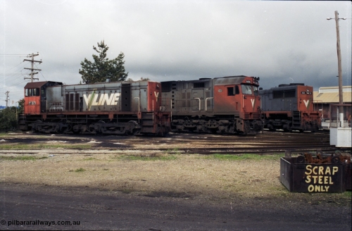 142-2-16
Wodonga loco depot turntable roads, stabled V/Line broad gauge locos share the table on a rainy Sunday arvo, Y class Y 137 Clyde Engineering EMD model G6B serial 65-403, N class N 474 'City of Traralgon' Clyde Engineering EMD model JT22HC-2 serial 87-1203 and X class X 53 Clyde Engineering EMD model G26C serial 75-800.
Keywords: Y-class;Y137;Clyde-Engineering-Granville-NSW;EMD;G6B;65-403;