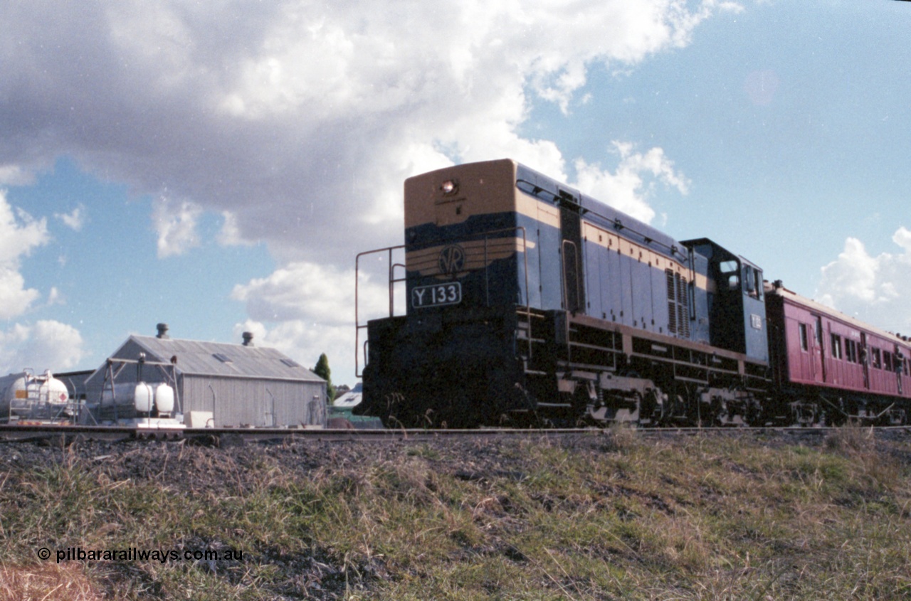 143-32
Wahgunyah, trailing shot of the up 'Stringybark Express' mixed special departing, Uncle Tobys factory is in the background, the reason for the line remaining open.
Keywords: Y-class;Y133;Clyde-Engineering-Granville-NSW;EMD;G6B;65-399;