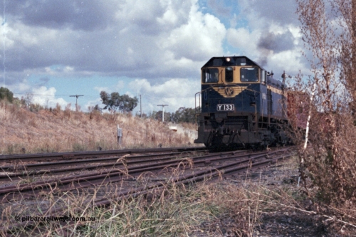 143-15
Springhurst, broad gauge VR liveried Y class Y 133 Clyde Engineering EMD model G6B serial 65-399 blast out of No. 2 Rd onto the Wahgunyah line with the down Wahgunyah mixed 'Stringybark Express' special, standard gauge line is on the embankment in the background, damn weeds...
Keywords: Y-class;Y133;Clyde-Engineering-Granville-NSW;EMD;G6B;65-399;