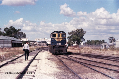 143-27
Wahgunyah, broad gauge VR liveried Y class Y 133 Clyde Engineering EMD model G6B serial 65-399 runs back onto the 'Stringybark Express' mixed special consist having run round the consist, Uncle Tobys and Inter City Mills Aust building are behind the loco.
Keywords: Y-class;Y133;Clyde-Engineering-Granville-NSW;EMD;G6B;65-399;